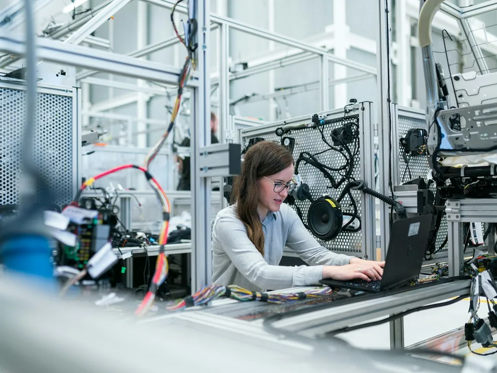 Industrial robot arm in a modern manufacturing and automation setting